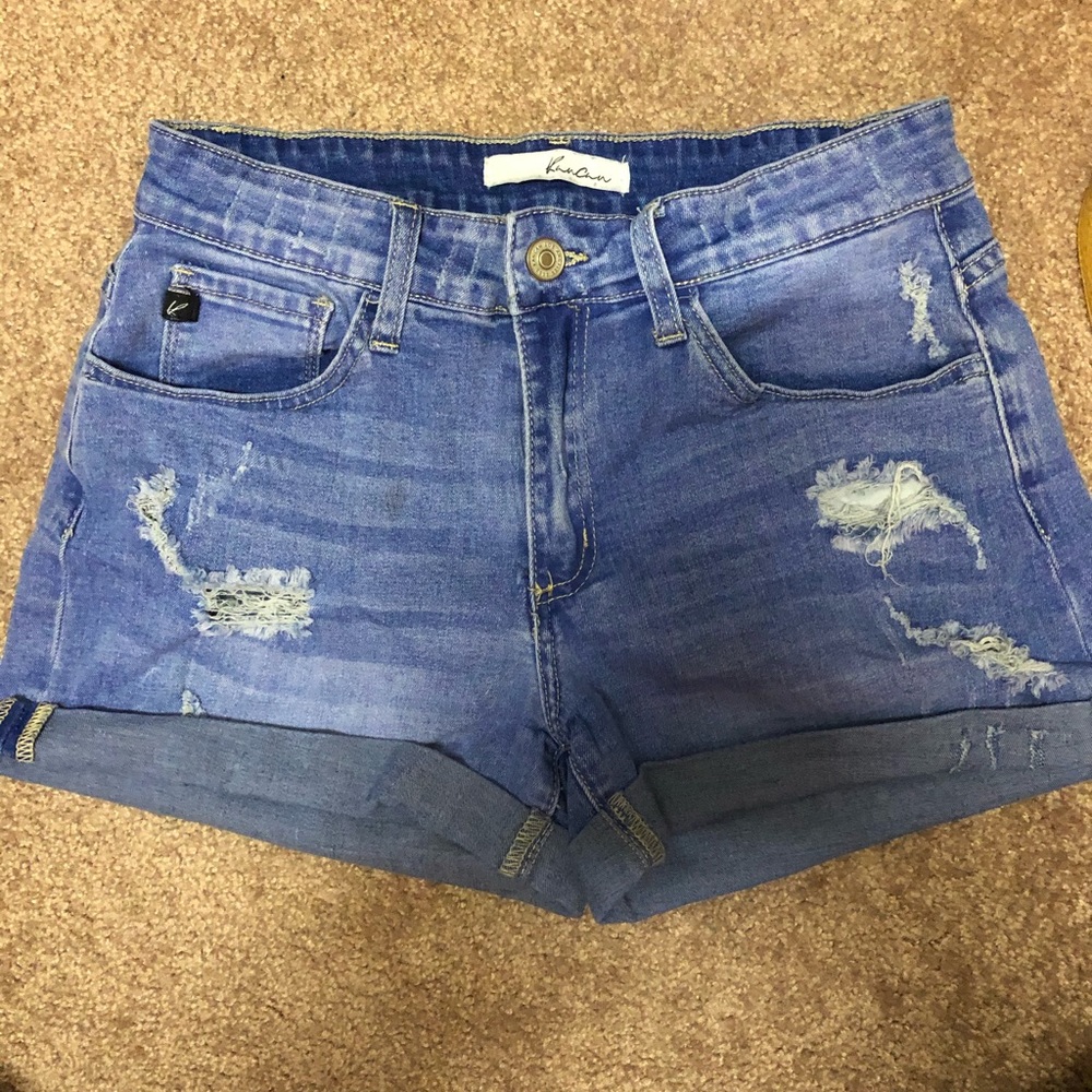 Distressed denim shorts